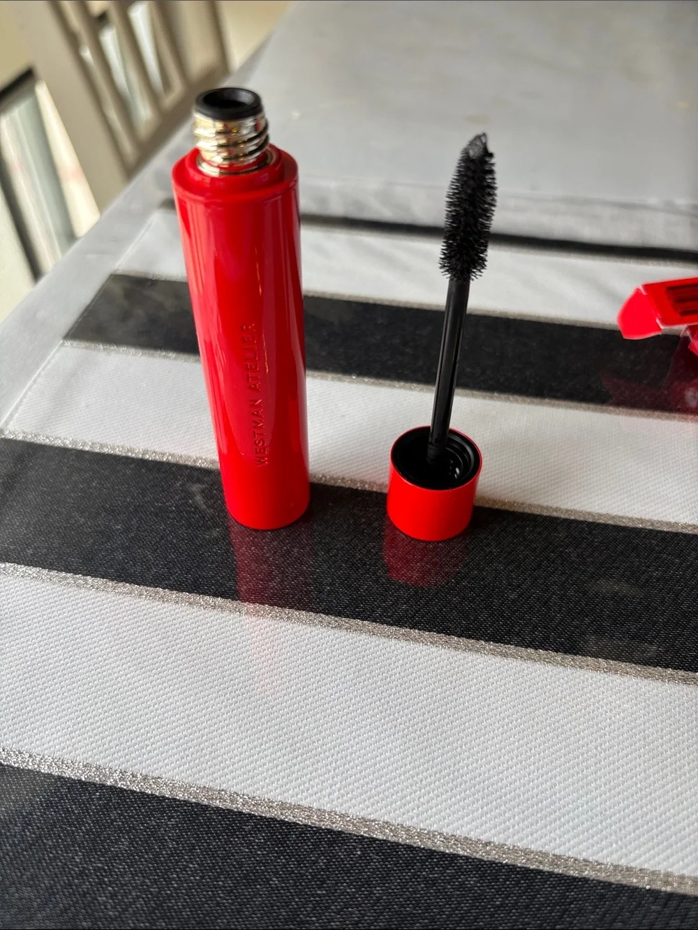 Westman Atelier mascara in bright red box